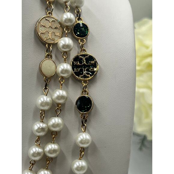 Tory Burch Authentic Long
Pearl Logo Medallion
Multi-Strand Gold 60" Necklace - Picture 5 of 15